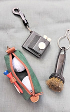 golfing accessories brush, golf tees holder/cleaner, bag holds 2 golf balls. 
