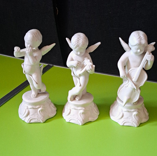 Zen white porcelain cherub - white,