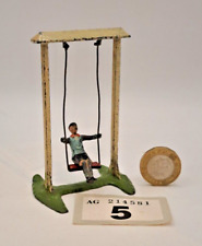 Britains 54mm hollow-cast lead farm figure: #619 Boy on garden swing