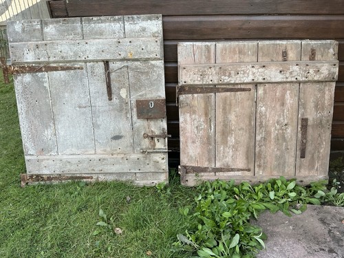 Two small pine doors needing