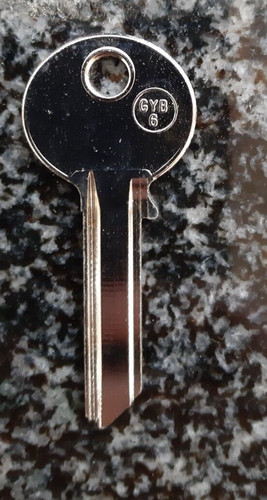 Yale round head silver key