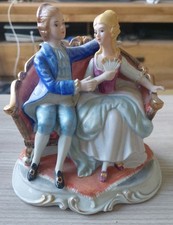 Lady And Gentleman On A Couch