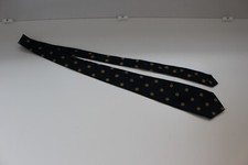 Toye Kenning & Spencer Tie