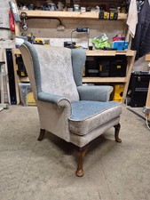 Parker Knoll Penshurst wing back chair recently re-upholstered.