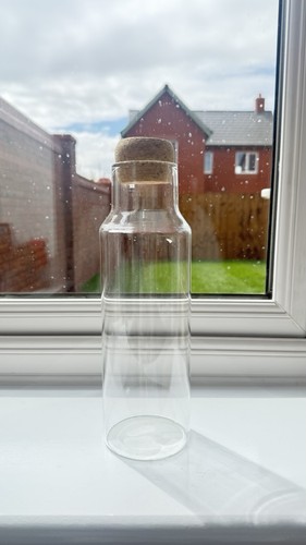 Clear glass storage bottle - glass,