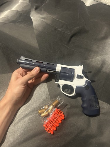 Spring powered toy - spring, revolver