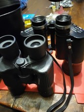 Three Pairs of Binoculars One