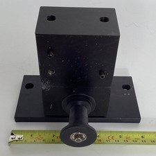 35mm CINEMA PROJECTOR FILM TRANSPORT/ GUIDE ROLLER AND MOUNTING BRACKET.