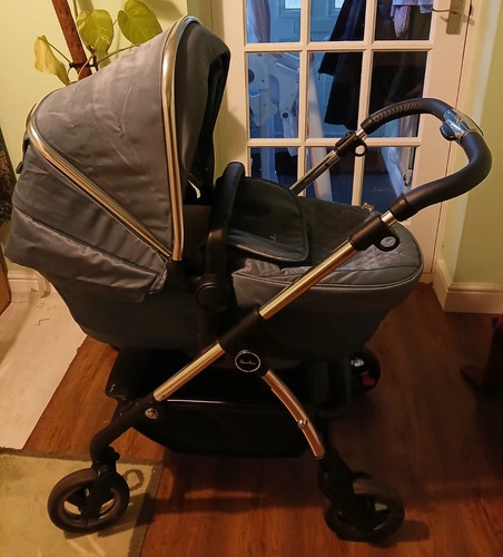 Silver cross pram with - cross,