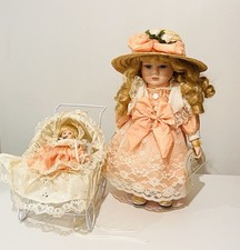 Leonardo Collection Porcelain Doll with Baby in Pram – Collector’s Set