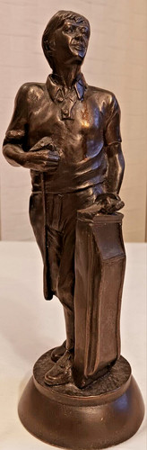 Bronze coloured male golfing - bronze,