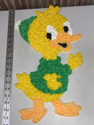 Melted plastic popcorn duck - melted,