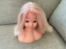 Kids hairdressing head. Hair. Beauty. Salon. Practice. Style. Fun. Girls