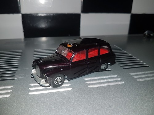 Dark maroon corgi toys - dark,