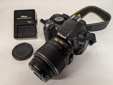 Nikon D3100 14.2MP DSLR Digital Camera + 18-55mm F/3.5-5.6G VR DX Zoom Lens