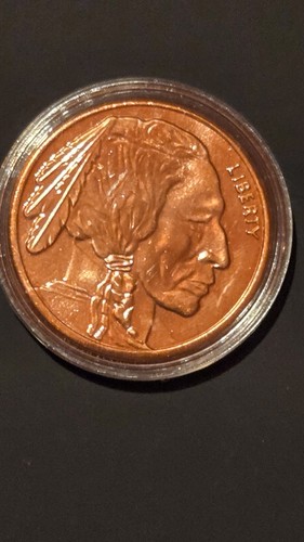 Indian head and bull oz - bull,