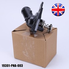 COOLANT THERMOSTAT & HOUSING