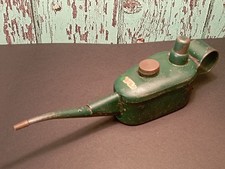Vintage Thumb Oil Can