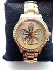 Avon beautiful gold watch with