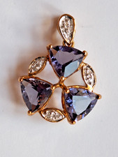 9ct gold Blue Kyanite Trilogy Pendant with diamond accents.