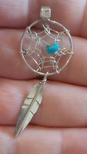 small sterling silver dream catcher Native American pendant