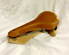Brooks style leather bicycle saddle, honey brown. 