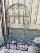Metal arched ornate - arched, gate