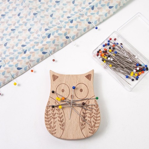 Needle minder with pin kit - with,
