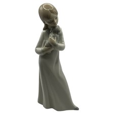 Zaphir Girl Holding Puppy