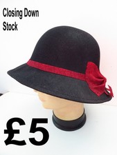 Womens Fashion hat in black with red bow trim  for general wear or funeral