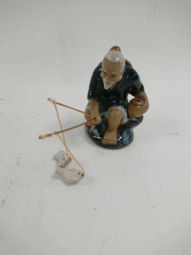 Vintage ceramic fisherman - ceramic,
