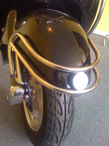Scooter crash bar front wheel