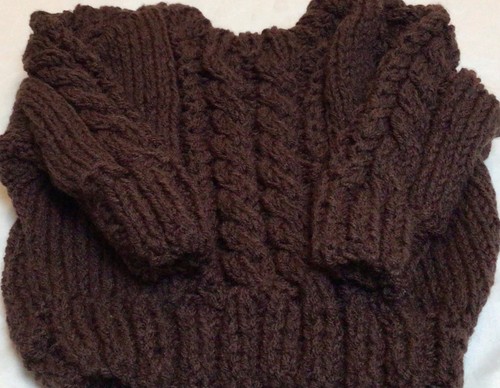 Hand knitted childs cable - hand,