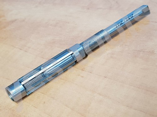 Adjustable expanding reamer - adjustable,