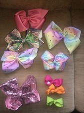 5 Jojo Siwa Bows And 4 Non