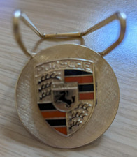 Porsche Clip with logo on gold