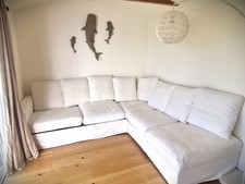 Large IKEA corner sofa bed with storage, used in good condition