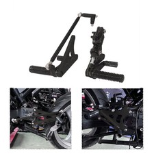 Relocated footpegs system rear
