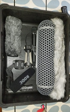 RODE NTG3 SHOTGUN MIC. Silver. With Blimp, furry, pistol grip and cover.