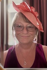 Gorgeous Unworn Quality Designer Fascinator in Coral Pink Headband With Bow