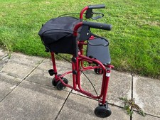 three wheeled walker with seat