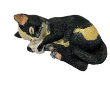 Miniature Black Sleeping Cat