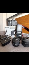 canon 5d mark ii with 2 lens and flash.