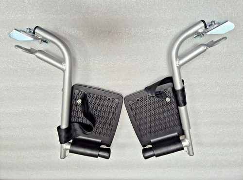 Pair footrests left right - of,