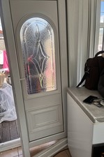 DOOR UPVC with decorative Double-Glazed Glass Panel And Comes With A Key