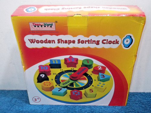 Wooden shape sorting - shape, clock