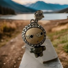 This is so cute a Rare Genuine Swarovski Elvis/Eliot charm stamped 