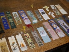 Collection of assorted bookmarks - leather / embroidered / paper / religious