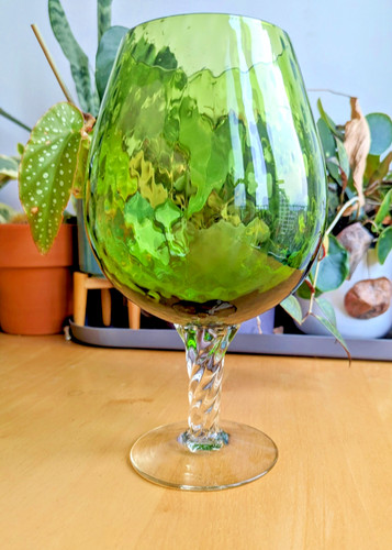 Oversized green glass brandy