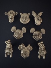 Disney’s Tigger, Piglet, Pooh, Minnie Mouse, 2 Mickey Mouse, 2 Goofy Brass Knobs
